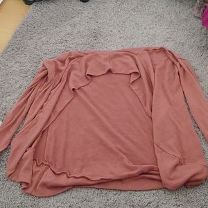 A dark pink cardigan